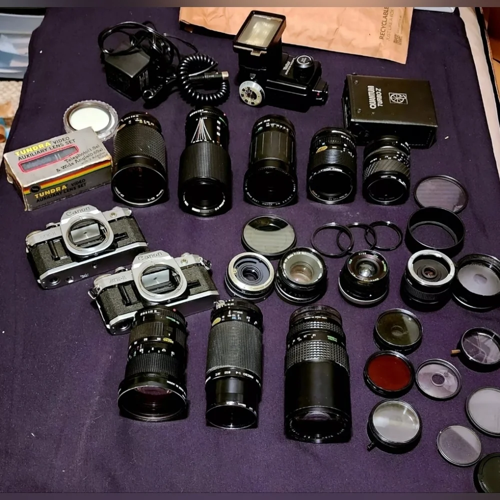 Two Canon cameras and lenses